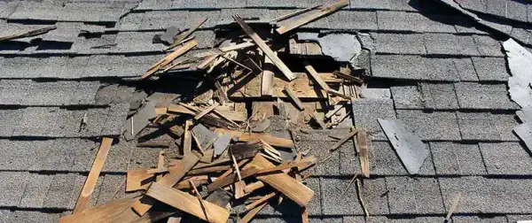 Old shingles torn off exposing the roof deck during a Central Florida roof replacement