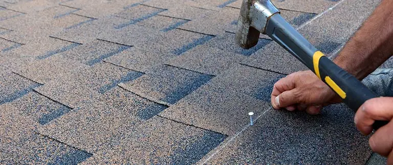 True Roofers crew repairing a Central Florida shingle roof